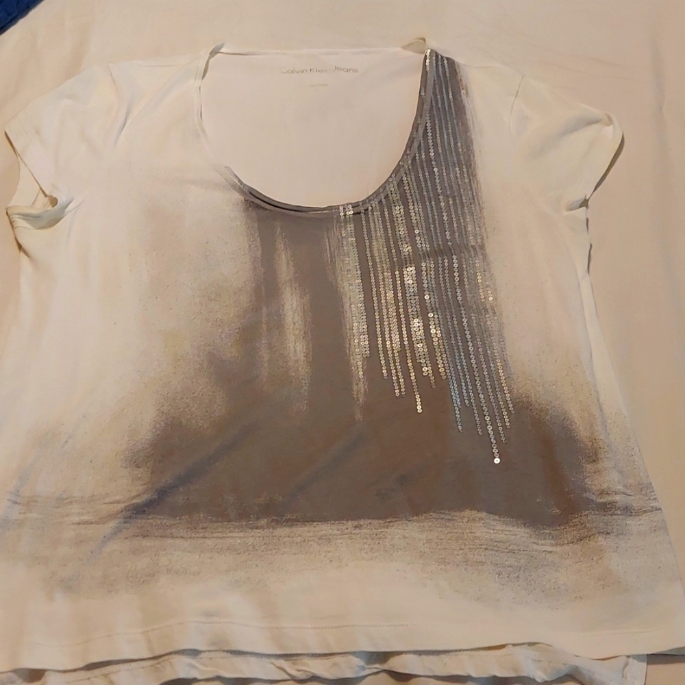 Calvin Kline Ladies top white with pearl sequins gray back ground
